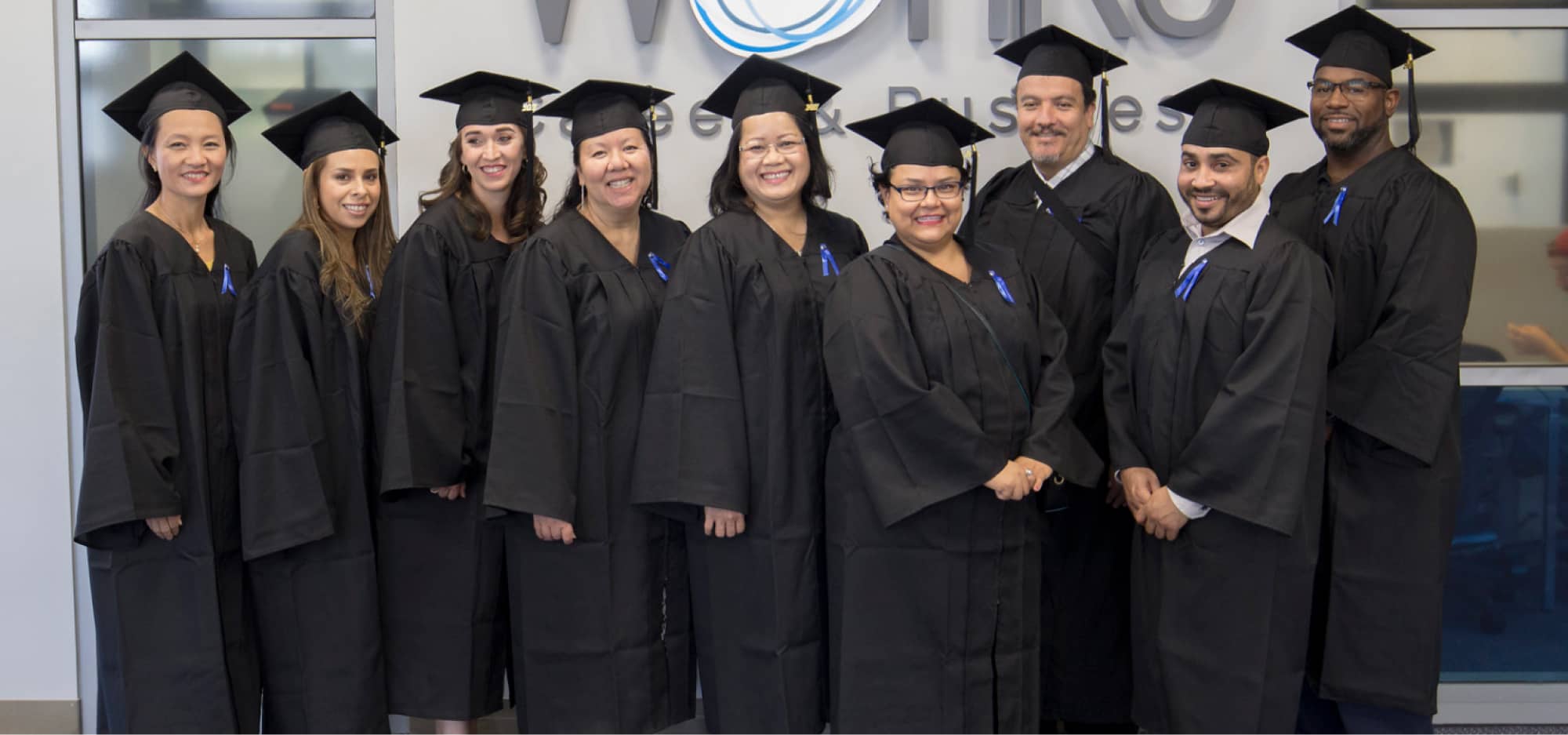 Group of graduates in robes.