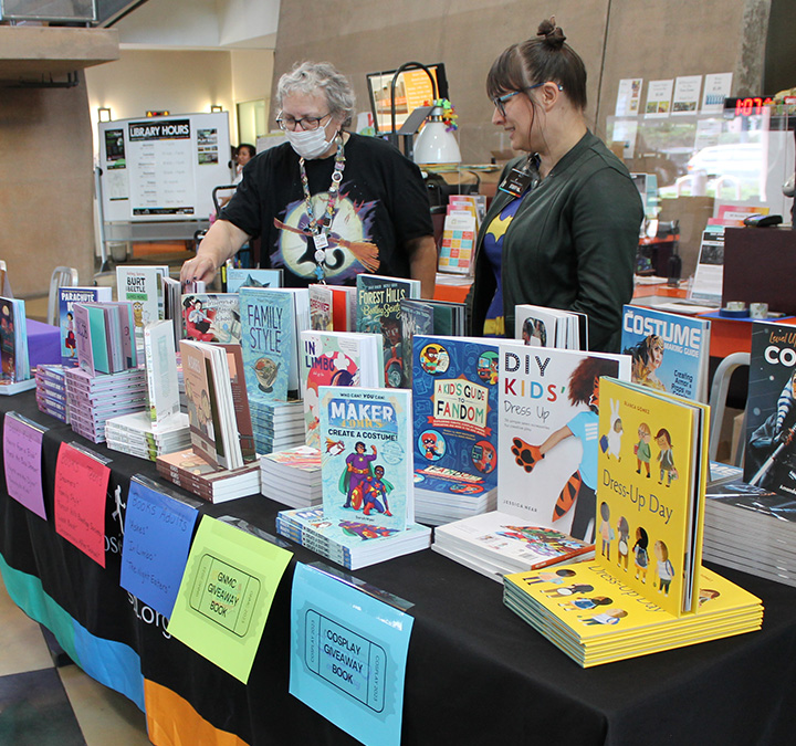 Graphic novels on display at graphic novel contest awards ceremony.
